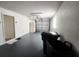 Spacious garage featuring ample storage, a rolling garage door, and functional interior for vehicle parking at 4058 Gatewood Dr, Sarasota, FL 34232