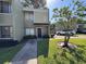 Attractive exterior view of the home with well-maintained landscaping at 4923 25Th W St # 104, Bradenton, FL 34207