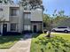 Charming condo featuring a neatly maintained lawn and inviting walkway leading to the front door at 4923 25Th W St # 104, Bradenton, FL 34207