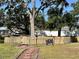 Enclosed community pet park featuring a gate, fencing, and grass at 4923 25Th W St # 104, Bradenton, FL 34207