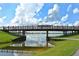 Scenic view of the bridge over a lake, with clear skies and reflecting water at 5242 Manorwood Dr Dr # 3A, Sarasota, FL 34235