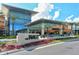 Inviting entrance to The Mall at University Town Center with lush landscaping and modern architecture at 5242 Manorwood Dr Dr # 3A, Sarasota, FL 34235