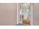 Entryway featuring hardwood floors and a view of the kitchen at 5242 Manorwood Dr Dr # 3A, Sarasota, FL 34235