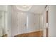 Bright foyer with hardwood floors, a white front door, and recessed lighting at 5242 Manorwood Dr Dr # 3A, Sarasota, FL 34235