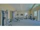 Community gym with modern exercise equipment, including treadmills, weight machines, and stationary bikes at 5242 Manorwood Dr Dr # 3A, Sarasota, FL 34235