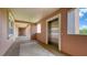 Hallway with elevator access and natural light featuring an appealing tile floor design and views of blue skies at 5242 Manorwood Dr Dr # 3A, Sarasota, FL 34235