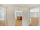 Open floor plan featuring hardwood floors and view into the kitchen and living room at 5242 Manorwood Dr Dr # 3A, Sarasota, FL 34235