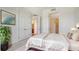 Well-lit main bedroom provides access to a large walk-in closet and a private bathroom at 5242 Manorwood Dr Dr # 3A, Sarasota, FL 34235