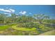 Scenic outdoor view with lush greenery and water features, providing an inviting view from inside the residence at 5242 Manorwood Dr Dr # 3A, Sarasota, FL 34235