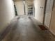 Unfinished basement with concrete floors offers ample storage space and potential for customization at 5601 Bentgrass Dr # 10-105, Sarasota, FL 34235