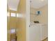 Easy-access laundry room with a side-by-side washer and dryer at 5601 Bentgrass Dr # 10-105, Sarasota, FL 34235