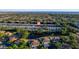 Aerial shot of homes with a pond in back and views of the bay in the distance at 6033 34Th W St # 132, Bradenton, FL 34210