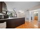 Modern kitchen featuring an island with marble countertops and stainless steel appliances at 6033 34Th W St # 132, Bradenton, FL 34210