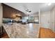 Spacious kitchen with granite countertops, stainless steel appliances, and ample cabinet space at 6033 34Th W St # 132, Bradenton, FL 34210