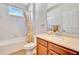 Bathroom with a tub and a large vanity with lots of counter space at 6729 45Th E Ter, Bradenton, FL 34203
