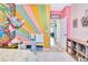 Vibrant bedroom with colorful walls, unique decor, and natural lighting at 6729 45Th E Ter, Bradenton, FL 34203