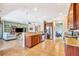 Open concept kitchen featuring granite countertops, stainless steel appliances, and an island with a breakfast bar at 6729 45Th E Ter, Bradenton, FL 34203