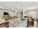 Open floor plan combining kitchen, living, and dining areas for seamless entertaining and Gathering living at 6936 White Willow Ct, Sarasota, FL 34243