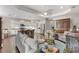 Open-concept living space with seamless flow between kitchen, living area, and dining space at 6936 White Willow Ct, Sarasota, FL 34243