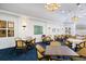 An elegant dining area featuring comfortable seating and stylish decor at 72 Grande Fairway, Englewood, FL 34223
