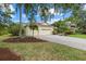 Spacious three car garage with a long driveway and well maintained landscaping at 7602 Partridge Street Cir, Bradenton, FL 34202