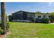 Charming home with a well-manicured lawn and mature landscaping at 8467 Imperial Cir, Palmetto, FL 34221