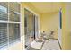 This balcony provides a private outdoor space, perfect for enjoying the weather at 8827 White Sage Loop, Lakewood Ranch, FL 34202