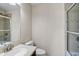 The ensuite bathroom features tile floors and a glass-enclosed shower at 8827 White Sage Loop, Lakewood Ranch, FL 34202
