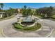 The Willowbrook community entrance is beautifully landscaped at the front with clear signage at 8827 White Sage Loop, Lakewood Ranch, FL 34202