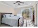 The main bedroom has natural light, creating a relaxing atmosphere at 8827 White Sage Loop, Lakewood Ranch, FL 34202