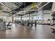 Well-equipped fitness center with state-of-the-art machines and large windows offering scenic views at 9061 Luna Ln, Sarasota, FL 34241
