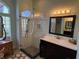 Bathroom with glass enclosed shower, and modern vanity at 3724 71St E Ter, Sarasota, FL 34243