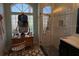 Bathroom with glass enclosed shower, and modern vanity at 3724 71St E Ter, Sarasota, FL 34243