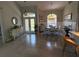 Bright open living space with natural light, a dining table, and modern furnishings, perfect for gatherings at 3724 71St E Ter, Sarasota, FL 34243