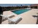Outdoor swimming pool with clear water and lounge chairs for relaxation, surrounded by a concrete deck at 3724 71St E Ter, Sarasota, FL 34243