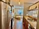 Modern kitchen offering updated appliances, granite countertops and hardwood floors throughout at 1010 Gun Club Rd, Sarasota, FL 34232