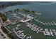 Picturesque aerial view of a marina with numerous boats docked, offering scenic waterfront living and recreational opportunities at 1155 N Gulfstream Ave # 706, Sarasota, FL 34236