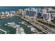 Aerial view of waterfront condos, the marina, and the bay at 1155 N Gulfstream Ave # 706, Sarasota, FL 34236