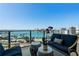 Relaxing balcony with comfortable seating and stunning marina views at 1155 N Gulfstream Ave # 706, Sarasota, FL 34236