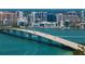 Scenic view of a bridge spanning the water, with buildings and skyline in the background at 1155 N Gulfstream Ave # 706, Sarasota, FL 34236