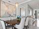 Elegant dining room with a wooden table, comfortable seating, and stylish decor, perfect for entertaining guests at 1155 N Gulfstream Ave # 706, Sarasota, FL 34236
