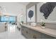 Spacious living space with dining area, modern decor, and water views at 1155 N Gulfstream Ave # 706, Sarasota, FL 34236