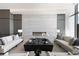 Contemporary community lounge featuring cozy sofas, modern fireplace, and elegant decor for a luxurious ambiance at 1155 N Gulfstream Ave # 706, Sarasota, FL 34236