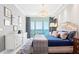 Inviting main bedroom boasts a beautiful marina view, elegant chandelier, and comfortable furnishings at 1155 N Gulfstream Ave # 706, Sarasota, FL 34236