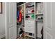 Well-organized walk-in closet features a shelving system, hanging rods, drawers, and ample space for storage at 11707 Gramercy Park Ave, Bradenton, FL 34211