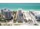 Aerial view of a beachfront property with immaculate landscaping at 1212 Benjamin Franklin Dr # 901, Sarasota, FL 34236