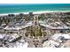 Stunning aerial view of coastal shopping district and park, showcasing the community's layout at 1212 Benjamin Franklin Dr # 901, Sarasota, FL 34236