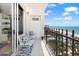 Balcony featuring seating and a stunning ocean view at 1212 Benjamin Franklin Dr # 901, Sarasota, FL 34236