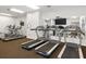 Well-equipped gym with treadmills and elliptical machines for a convenient workout at 1212 Benjamin Franklin Dr # 901, Sarasota, FL 34236