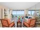 Spacious living room featuring comfortable seating and stunning ocean views at 1212 Benjamin Franklin Dr # 901, Sarasota, FL 34236